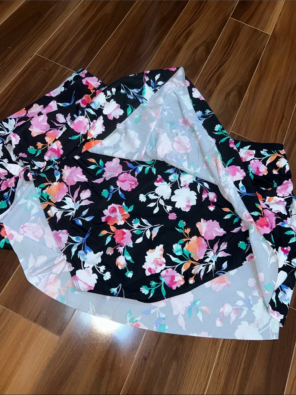 Size 4 Torrid Swim bottoms mini skirt side tie floral